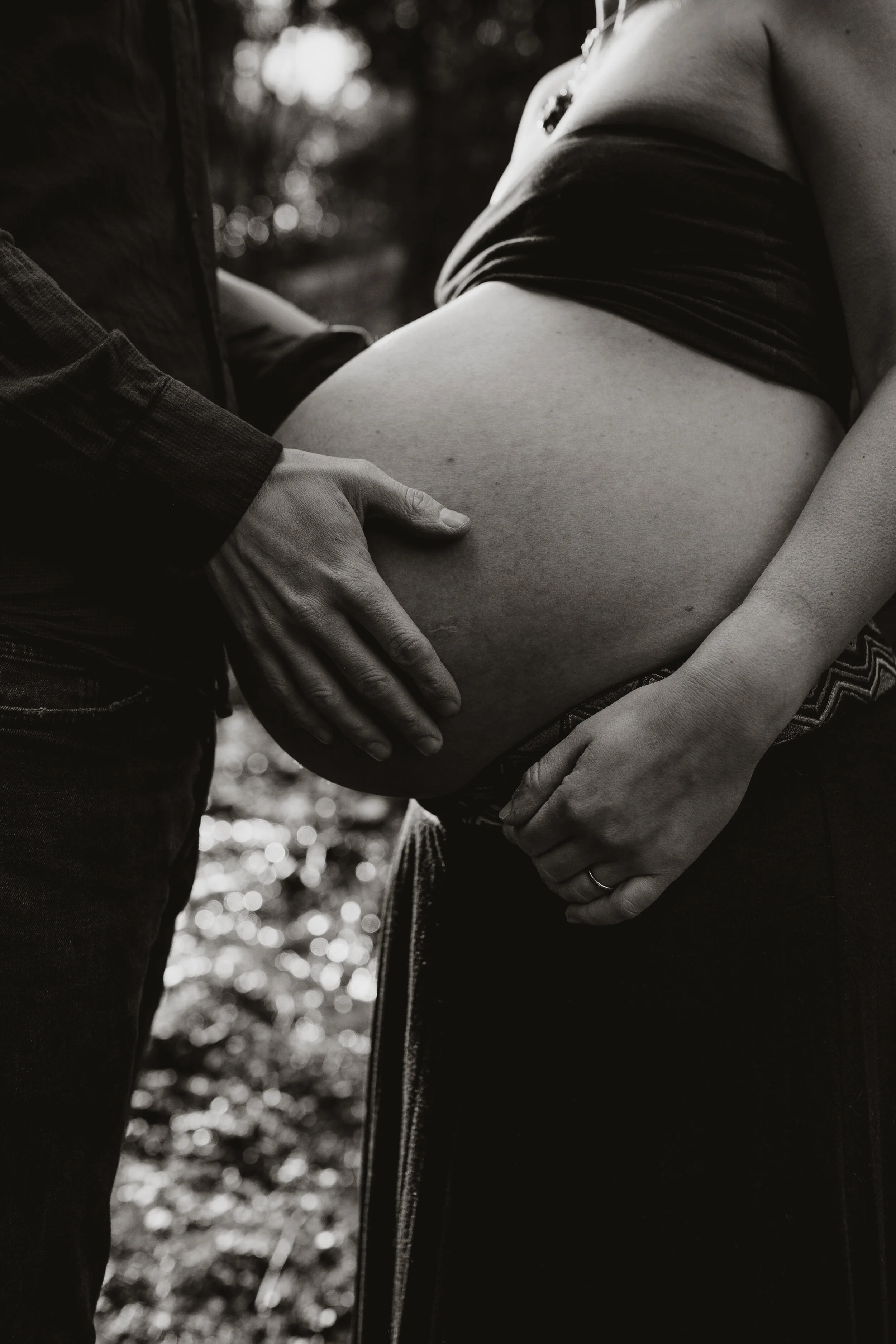 A pregnant woman standing in water